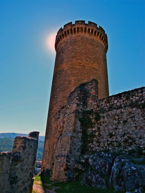 Soleil derrière la Tour Ronde