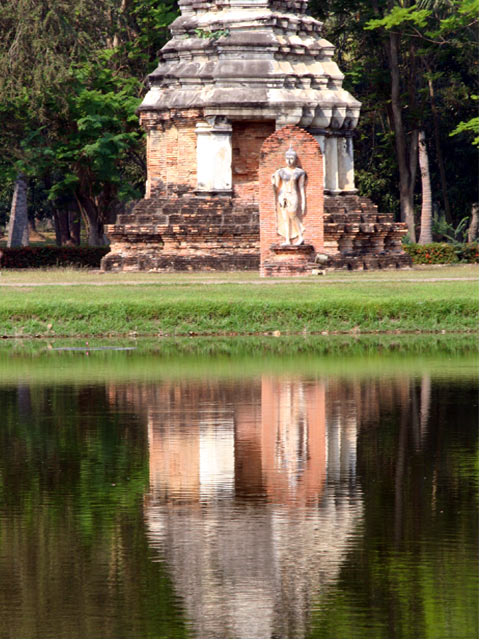 Statue and Chedi on water